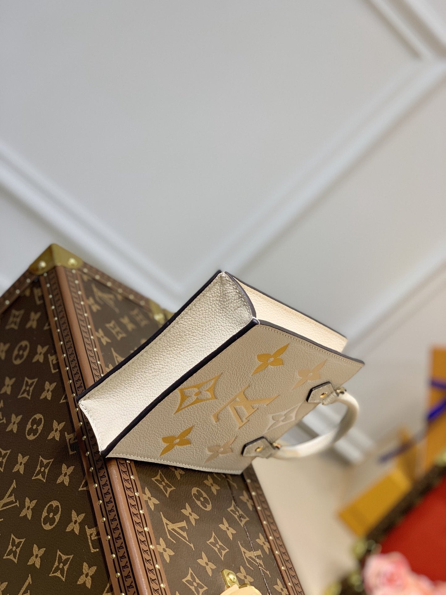 LV PETIT SAC PLAT CREAM MONOGRAM EMPREINTE COWHIDE LEATHER