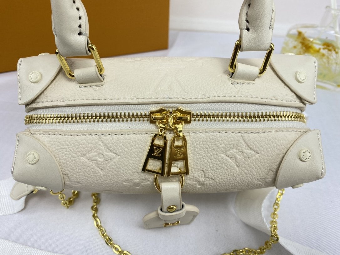 LV PETITE MALLE SOUPLE WHITE MONOGRAM EMPREINTE