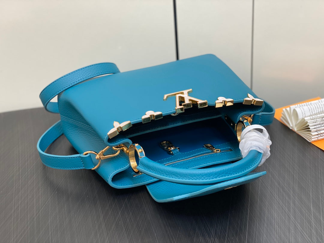 CAPUCINES BB 27 BLUE TAURILLON GOLD  HARDWARE