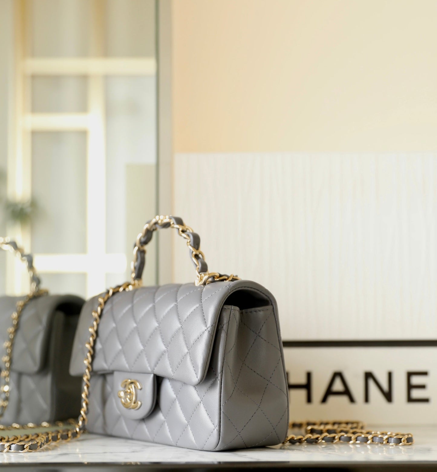 FLAP BAG 23 GREY LAMBSKIN GOLD HARDWARE TOP HAND