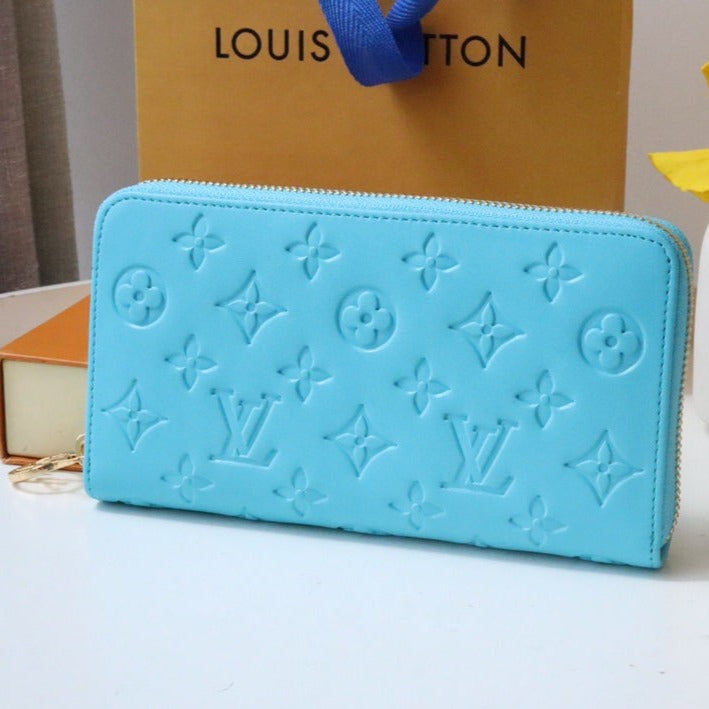 ZIPPY WALLET 19 CLOUD BLUE EMBOSSED LAMBSKIN