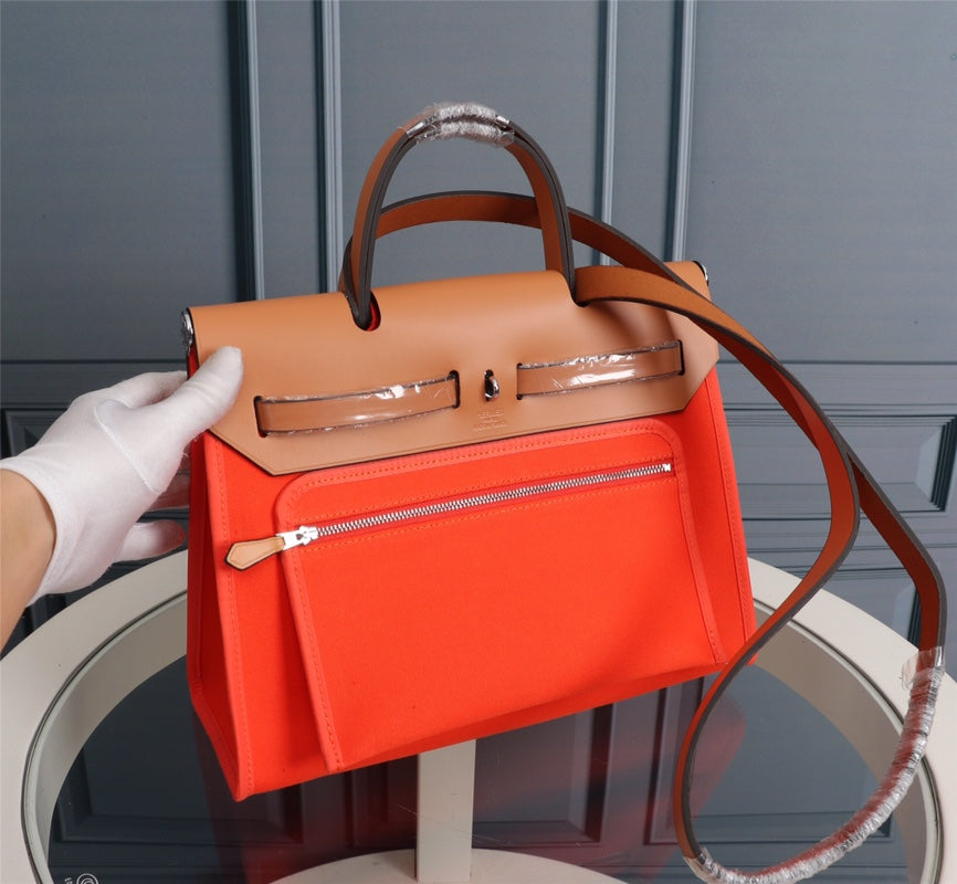 HM HERBAG ZIP 31 RED ORANGE AND COPPER CANVAS