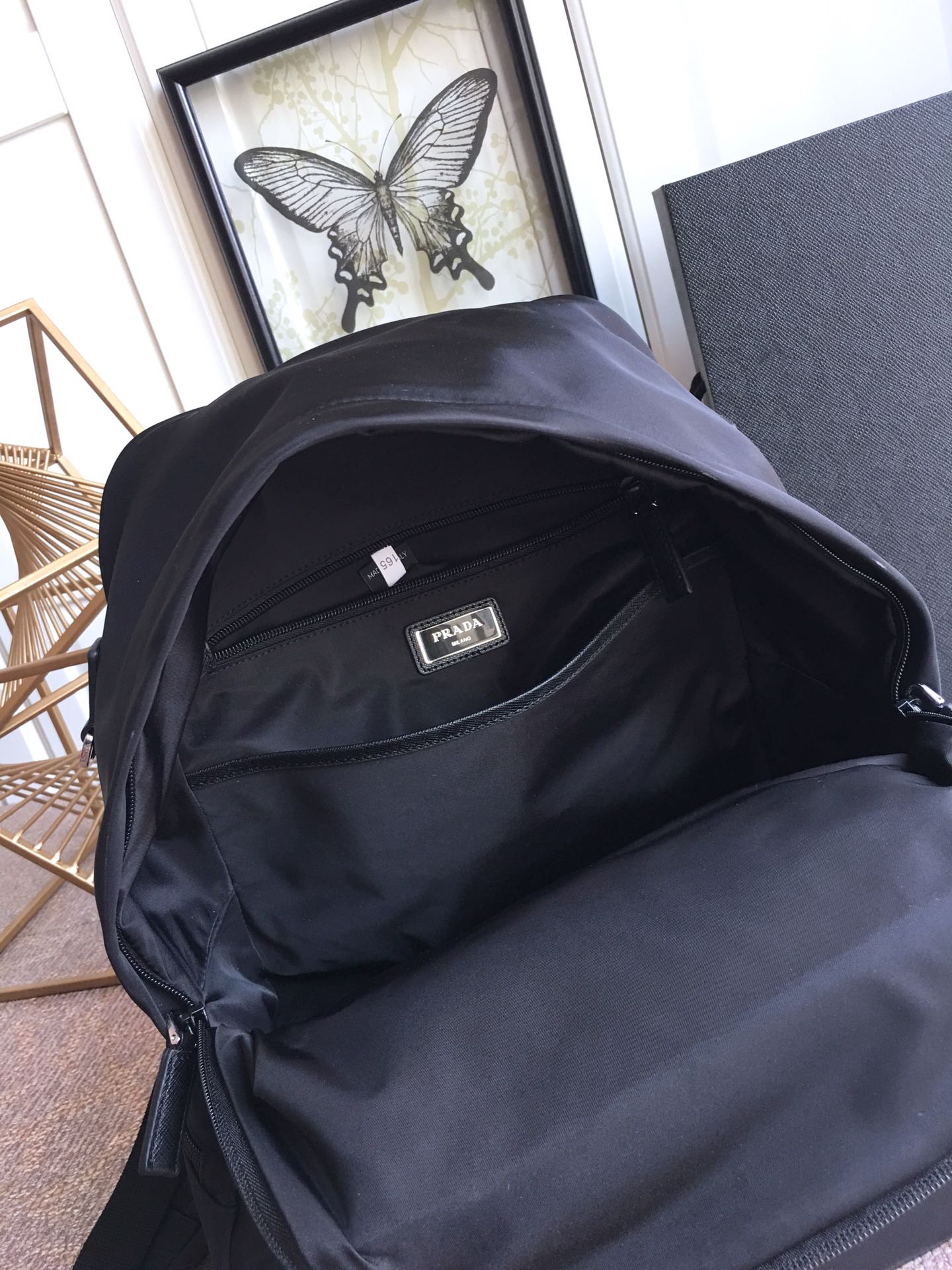 TRIANGLE LOGO BACKPACK 40 IN BLACK RE-NYLON