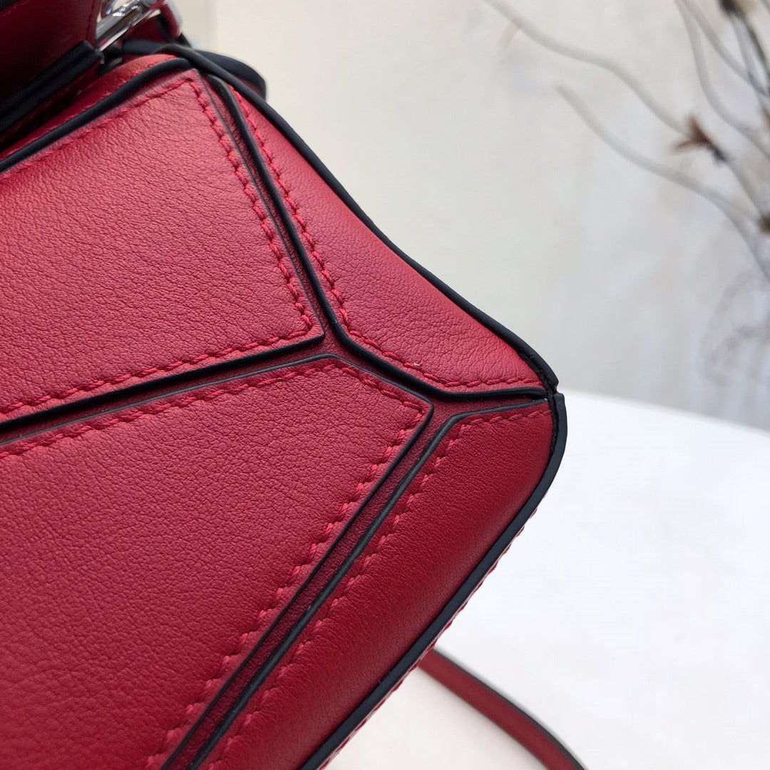 LOE MINI 18 PUZZLE BAG IN CHERRY RED CALFSKIN