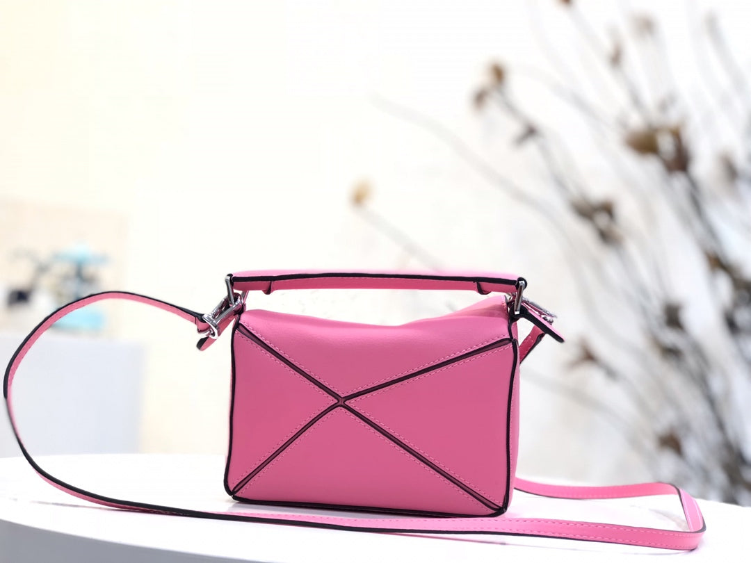 LOE MINI 18 PUZZLE BAG IN DEEP PINK CALFSKIN