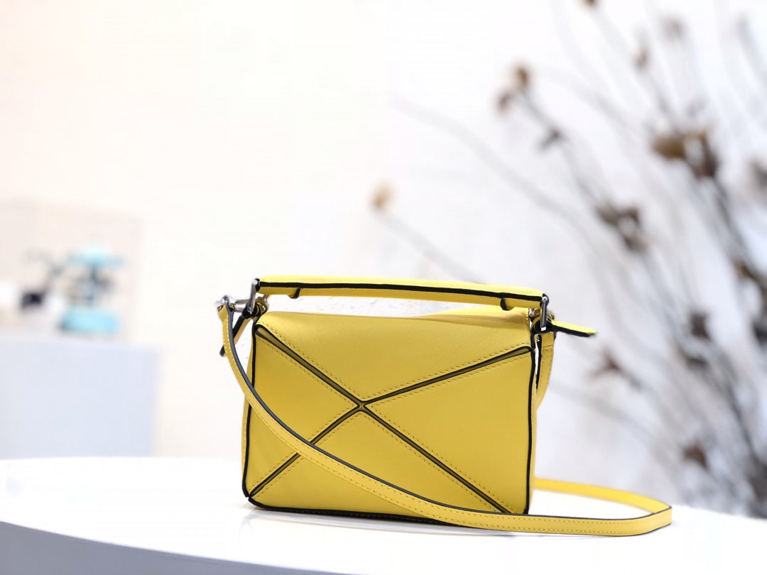 LOE MINI 18 PUZZLE BAG IN YELLOW CALFSKIN