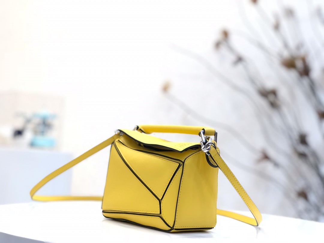 LOE MINI 18 PUZZLE BAG IN YELLOW CALFSKIN