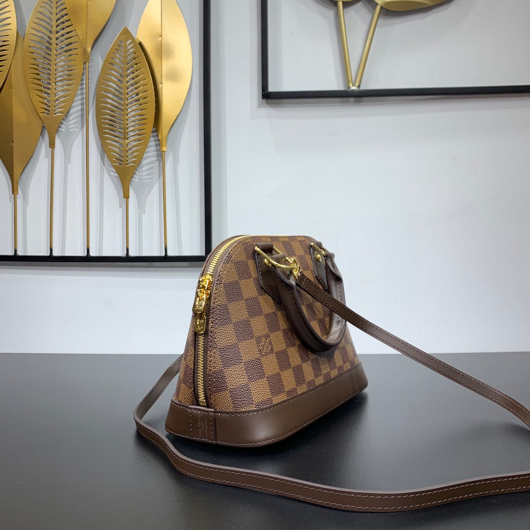 BRAIDED ALMA BB 23 IN BROWN DAMIER EBENE CANVAS GOLD BUCKLE