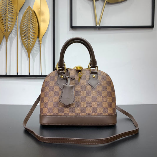 BRAIDED ALMA BB 23 IN BROWN DAMIER EBENE CANVAS GOLD BUCKLE