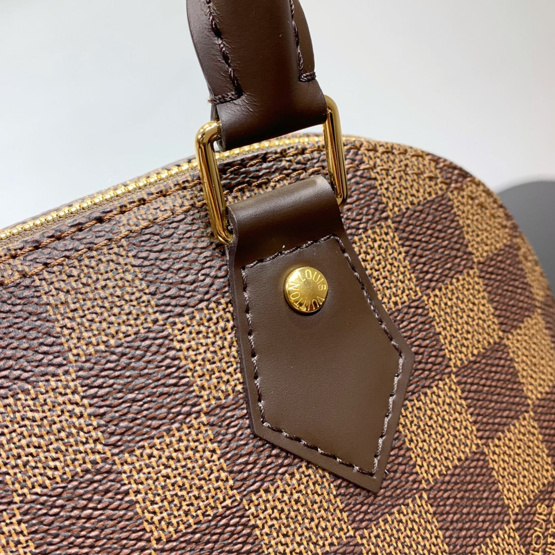 BRAIDED ALMA BB 23 IN BROWN DAMIER EBENE CANVAS GOLD BUCKLE