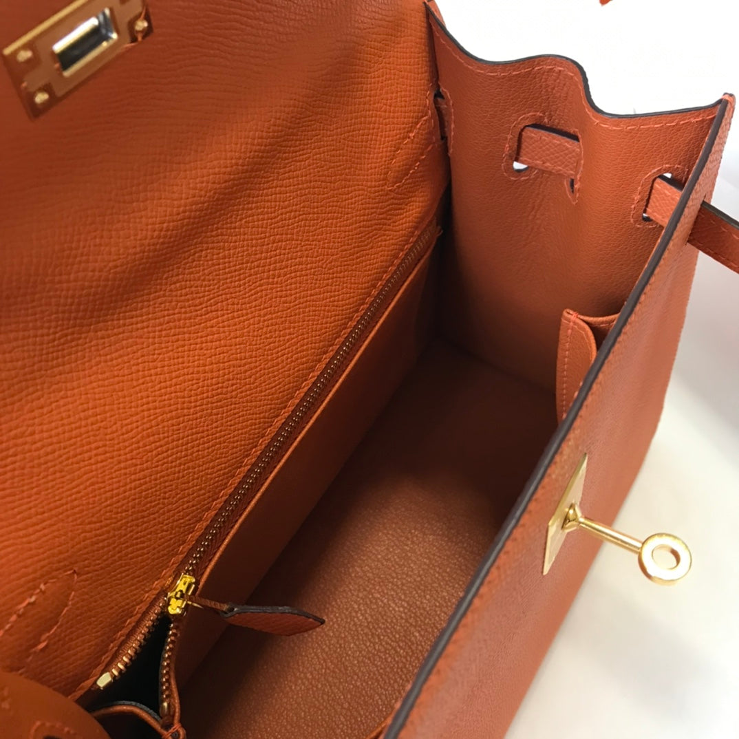 HM KELLY 32CM BAG IN ORANGE CALFSKIN GOLD HARDWARE