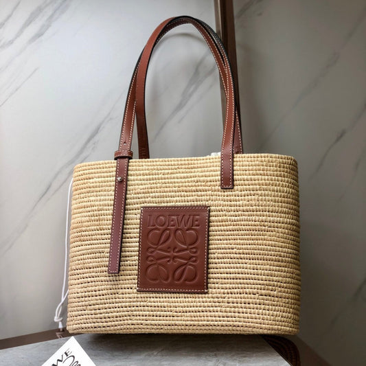 LOE SQUARE BASKET BAG 28 IN NATURAL RAFFIA AND CHOCOLATE BROWN CALFSKIN