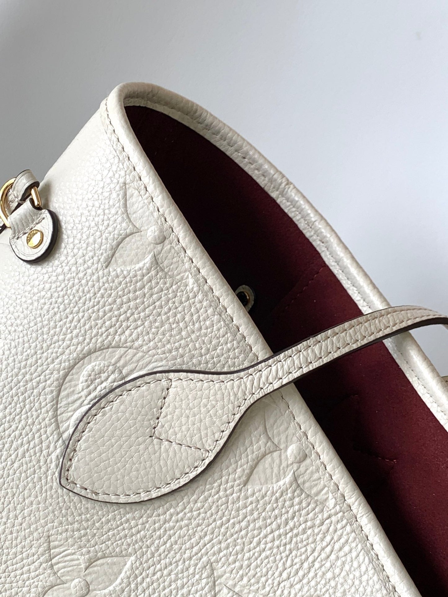 NEVERFULL MM 32 WHITE MONOGRAM EMPREINTE LEATHER