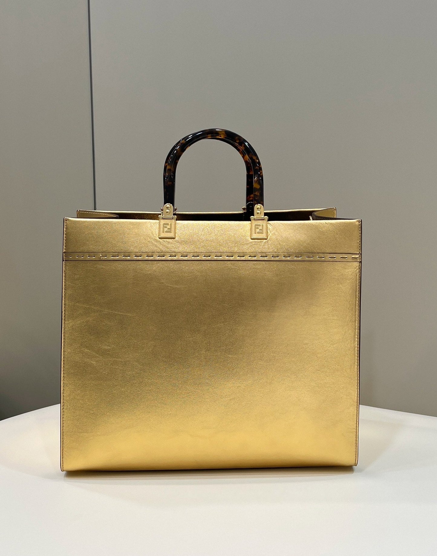 SHINE LARGE 35 TOTE IN GOLDEN CALFSKIN