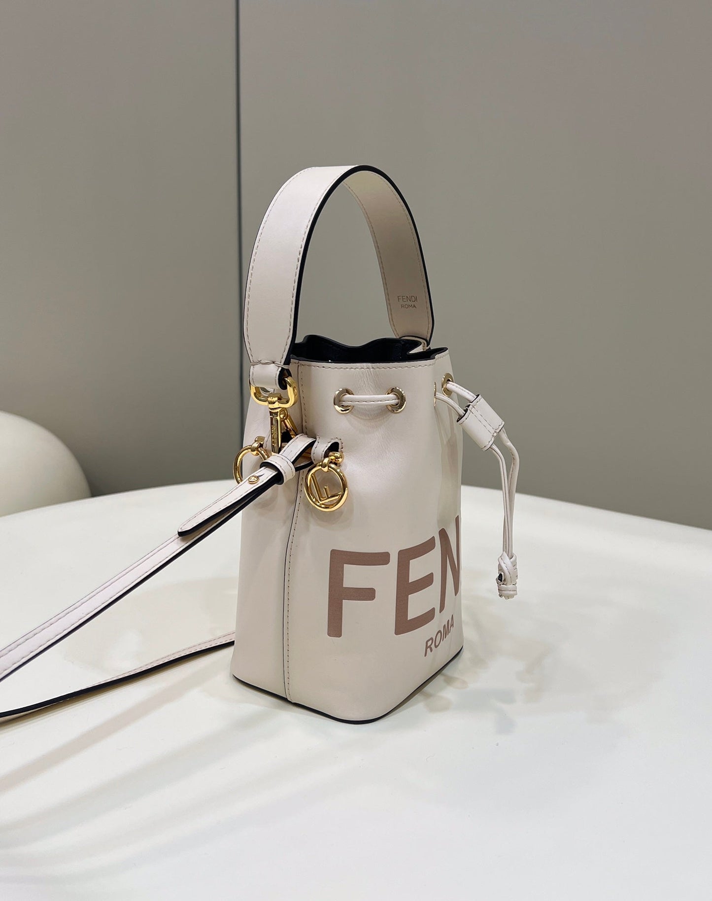 MON TRESOR MINI 18 BAG IN WHITE CALFSKIN FF WITH GOLD HARDWARE