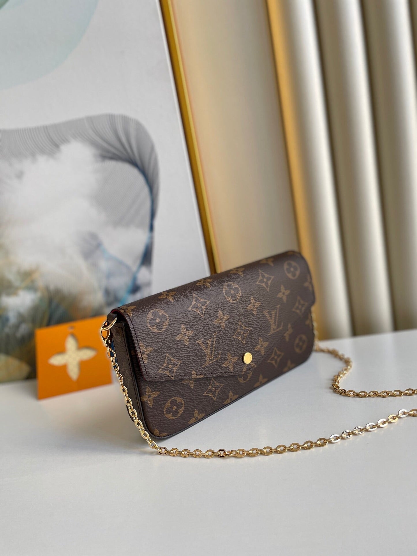 FÉLICIE POCHETTE 21 IN BROWN MONOGRAM CANVAS GOLD HARDWARE