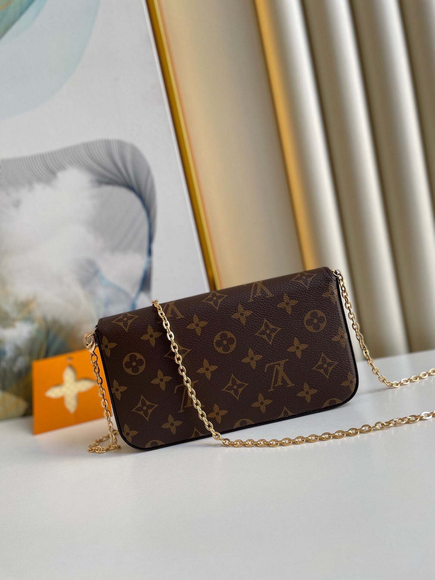 FÉLICIE POCHETTE 21 IN BROWN MONOGRAM CANVAS GOLD HARDWARE