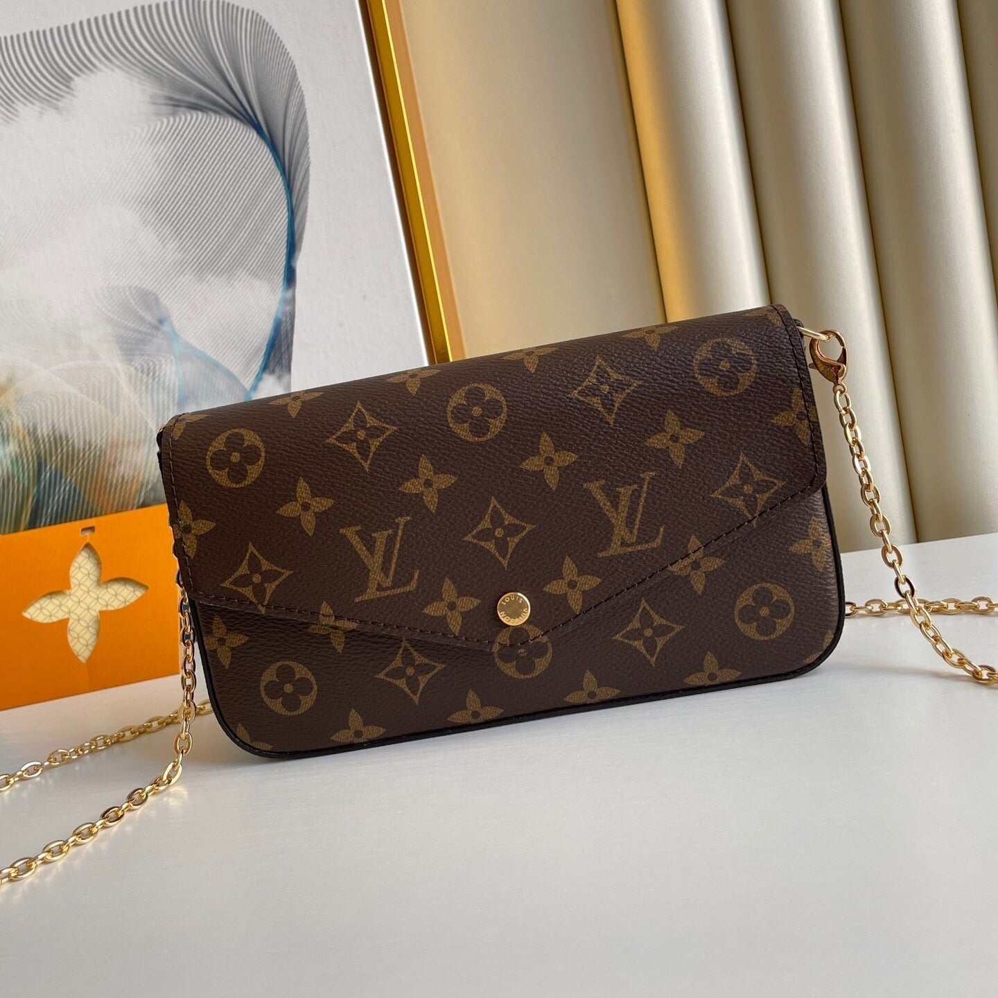 FÉLICIE POCHETTE 21 IN BROWN MONOGRAM CANVAS GOLD HARDWARE