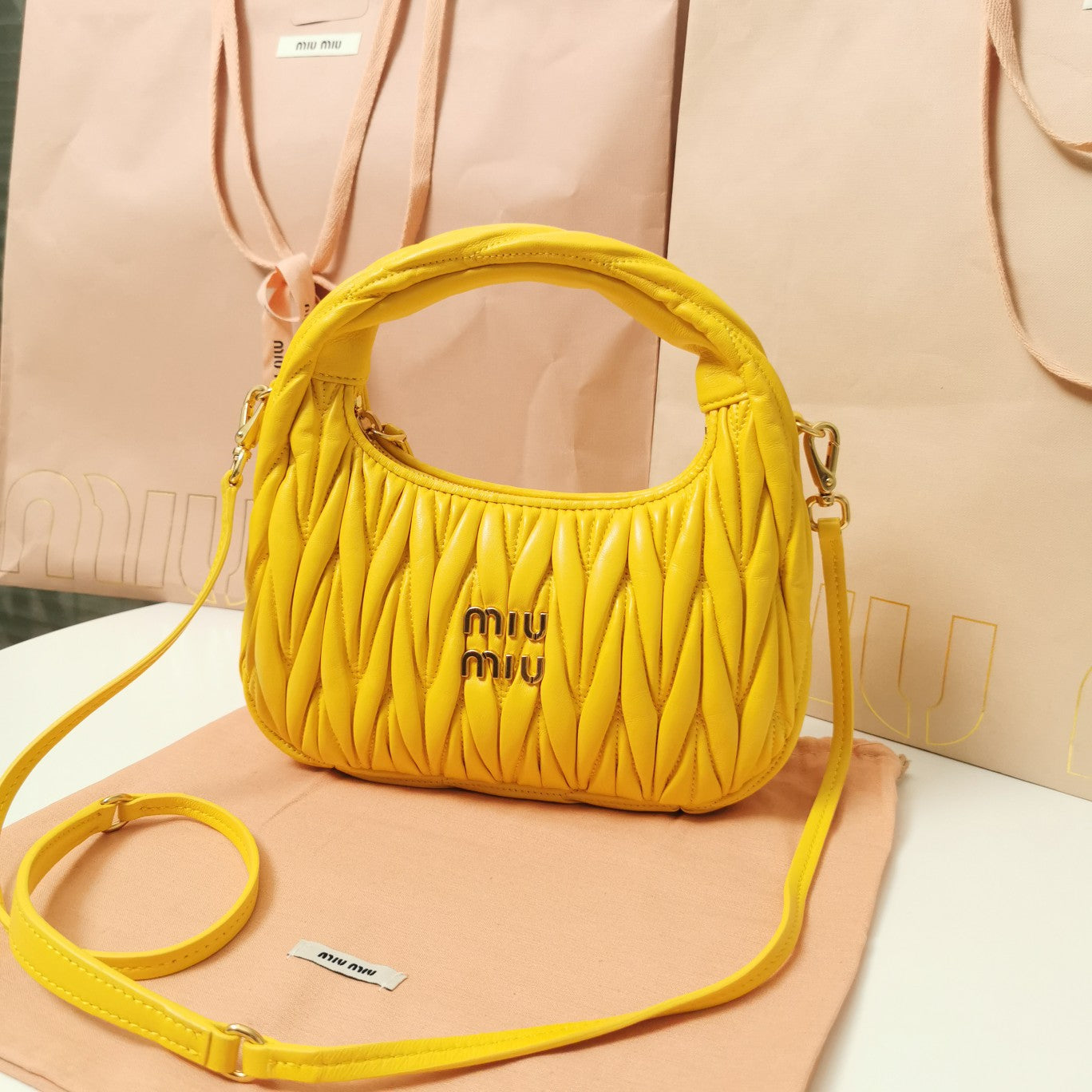 WANDER MATELASSÉ NAPPA HOBO BAG 23 IN YELLOW LAMBSKIN