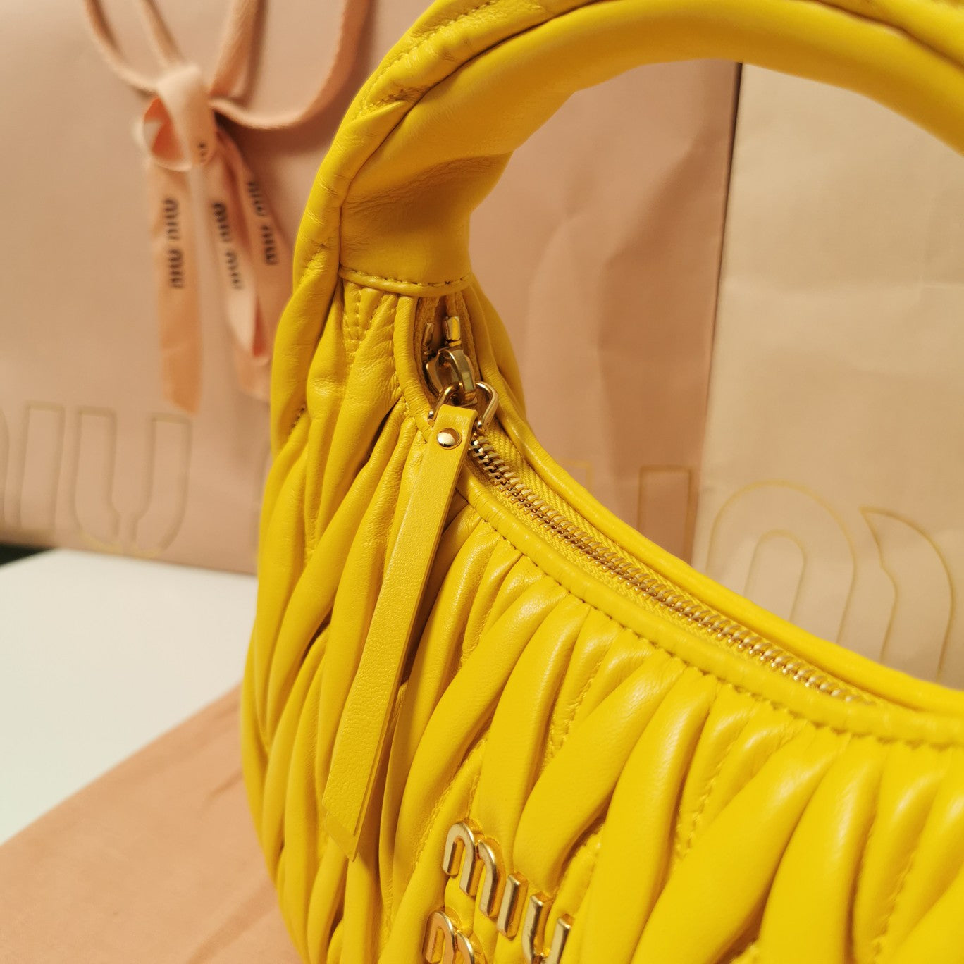 WANDER MATELASSÉ NAPPA HOBO BAG 23 IN YELLOW LAMBSKIN