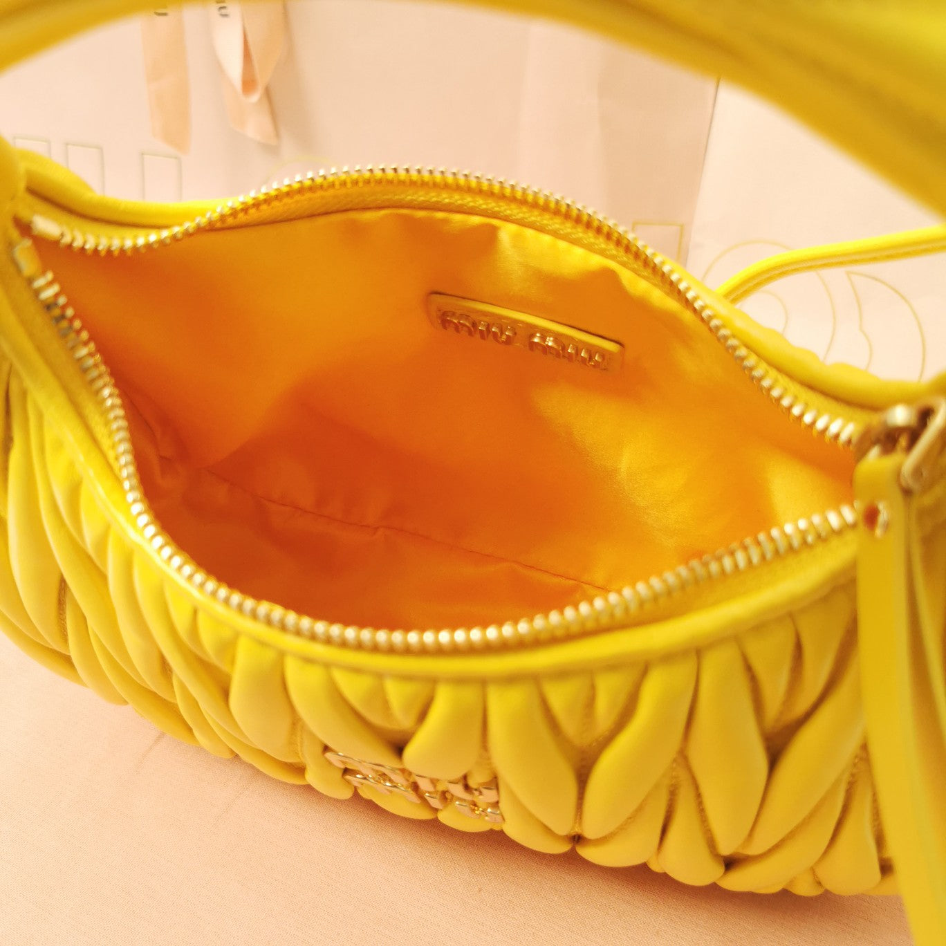 WANDER MATELASSÉ NAPPA HOBO BAG 23 IN YELLOW LAMBSKIN