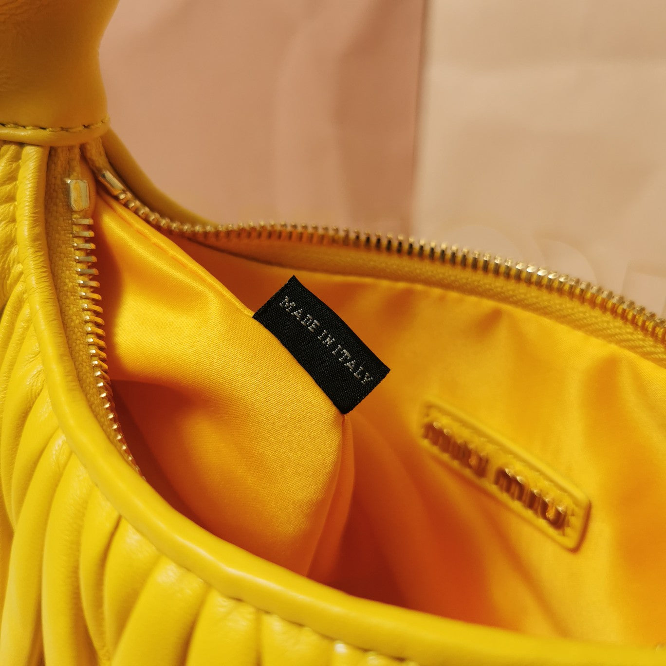 WANDER MATELASSÉ NAPPA HOBO BAG 23 IN YELLOW LAMBSKIN