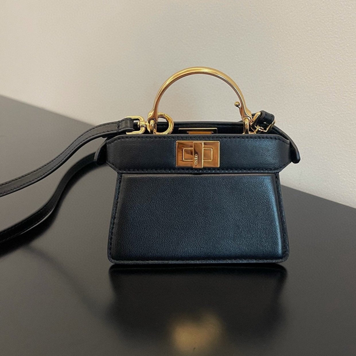 FENDI PEEKABOO ISEEU MICRO 12 BAG IN BLACK CALFSKIN WITH GOLD HARDWARE