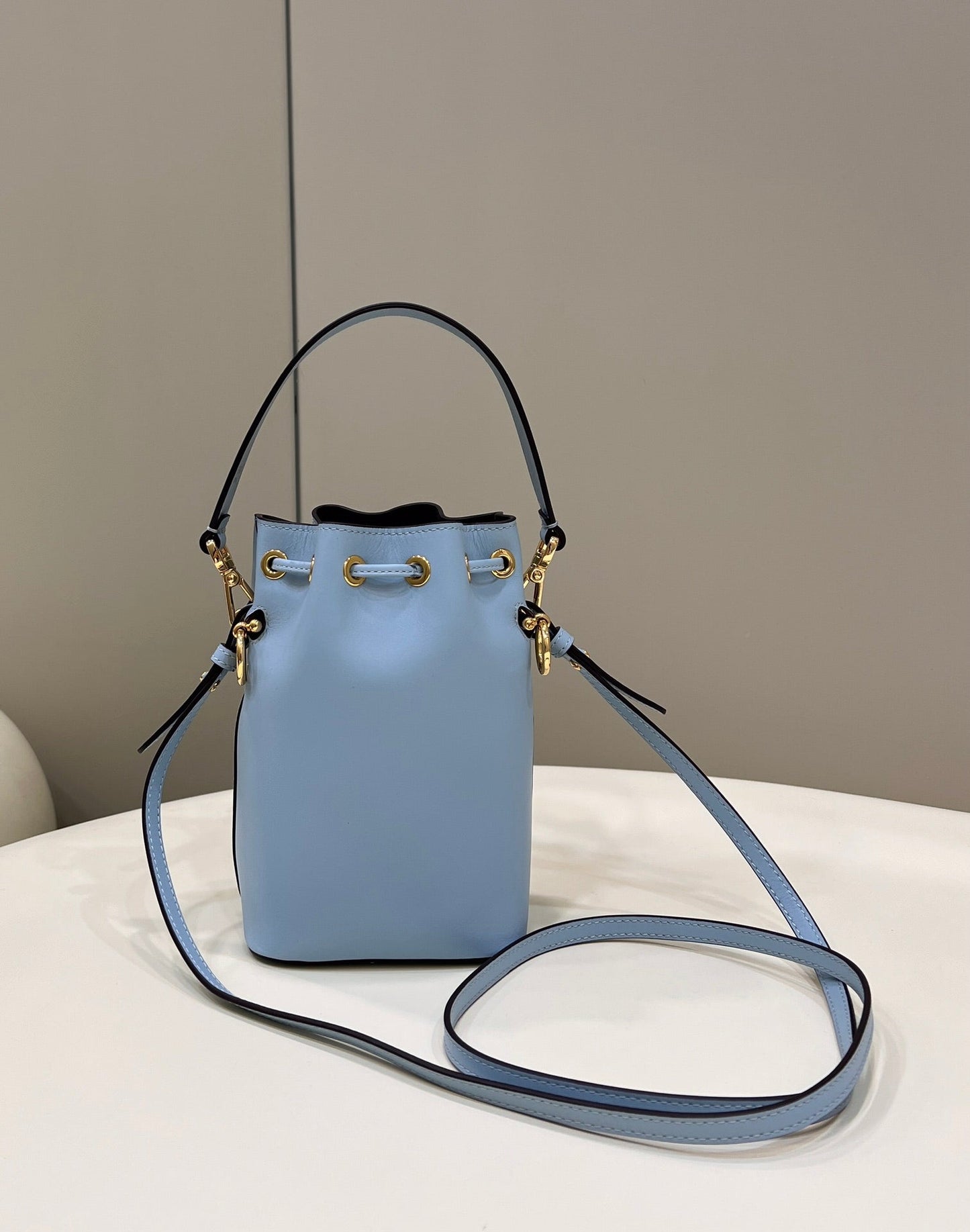 MON TRESOR MINI 18 BAG IN LIGHT BLUE CALFSKIN FF WITH GOLD HARDWARE