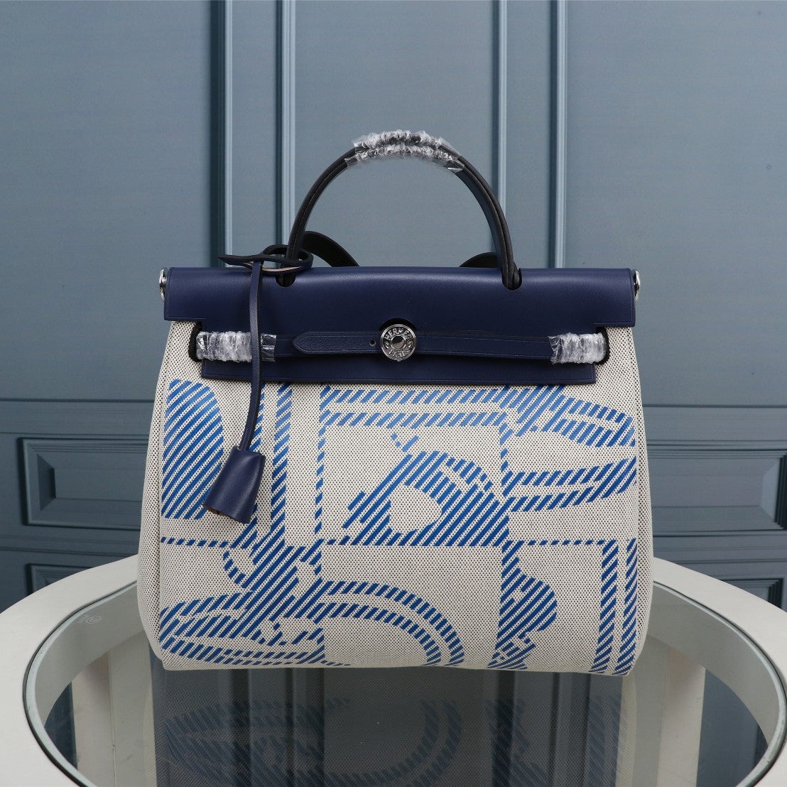 HM HERBAG ZIP 31 NAVY AND CREAM MONOGRAM CANVAS