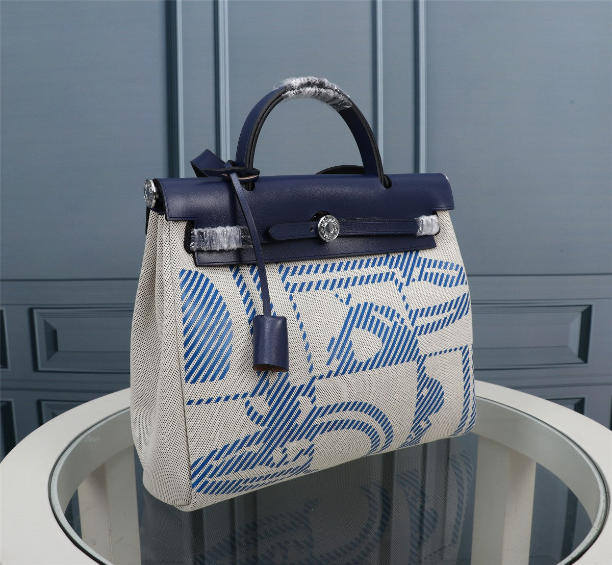 HM HERBAG ZIP 31 NAVY AND CREAM MONOGRAM CANVAS