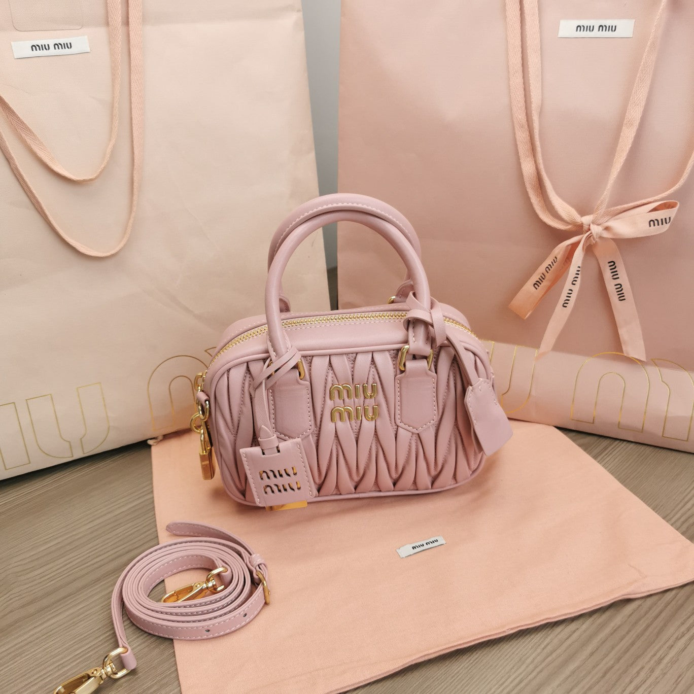 ARCADIE MATELASSÉ NAPPA SMALL BAG 19 IN PASTEL PINK LAMBSKIN GOLD HARDWARE