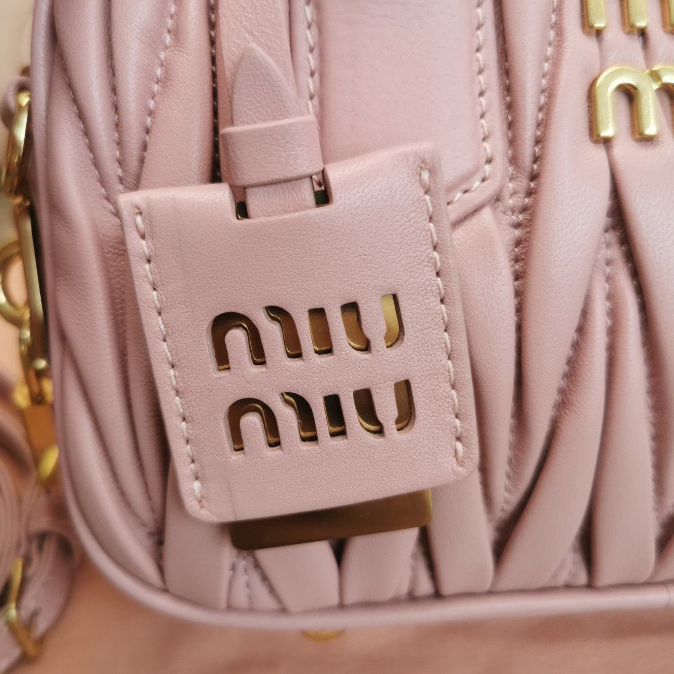 ARCADIE MATELASSÉ NAPPA SMALL BAG 19 IN PASTEL PINK LAMBSKIN GOLD HARDWARE