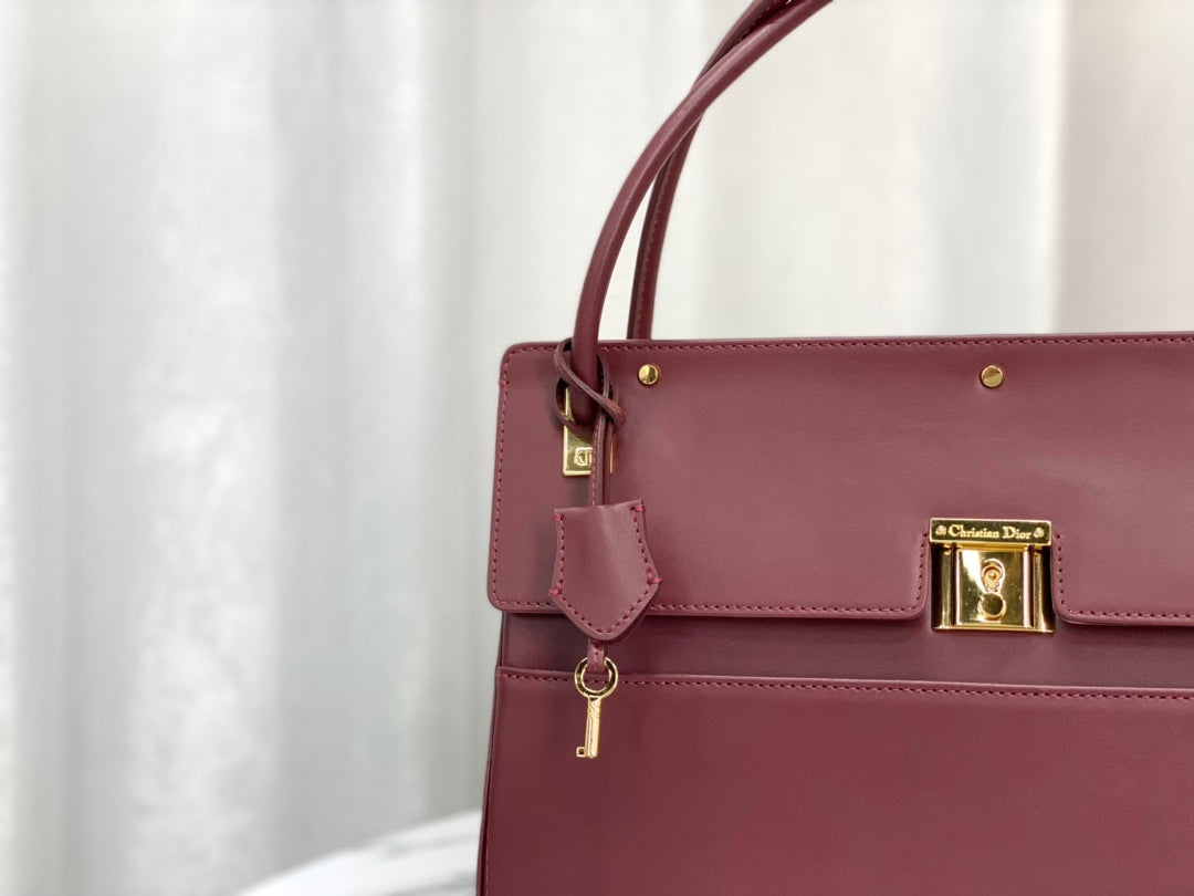 PARISIENNE 30 HANDBAG IN MULBERRY PURPLE SMOOTH CALFSKIN