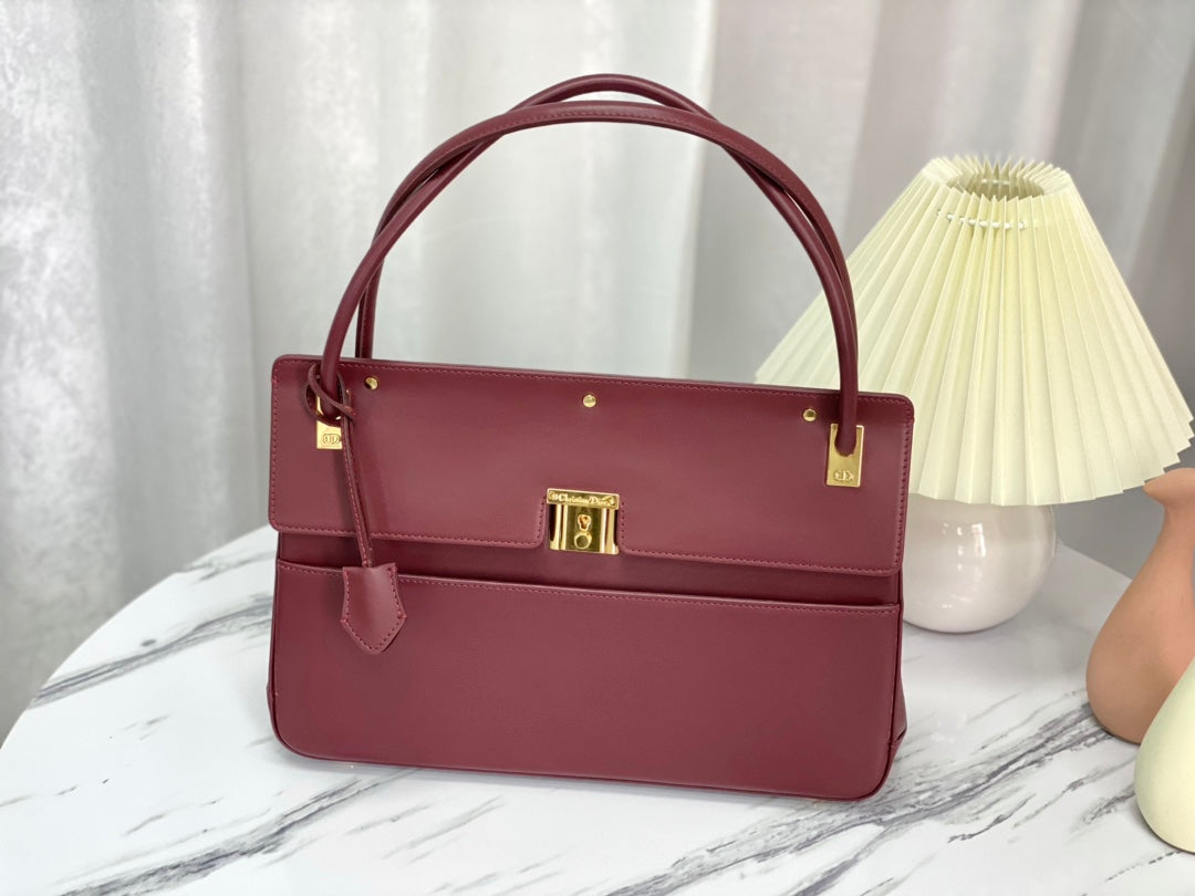 PARISIENNE 30 HANDBAG IN MULBERRY PURPLE SMOOTH CALFSKIN