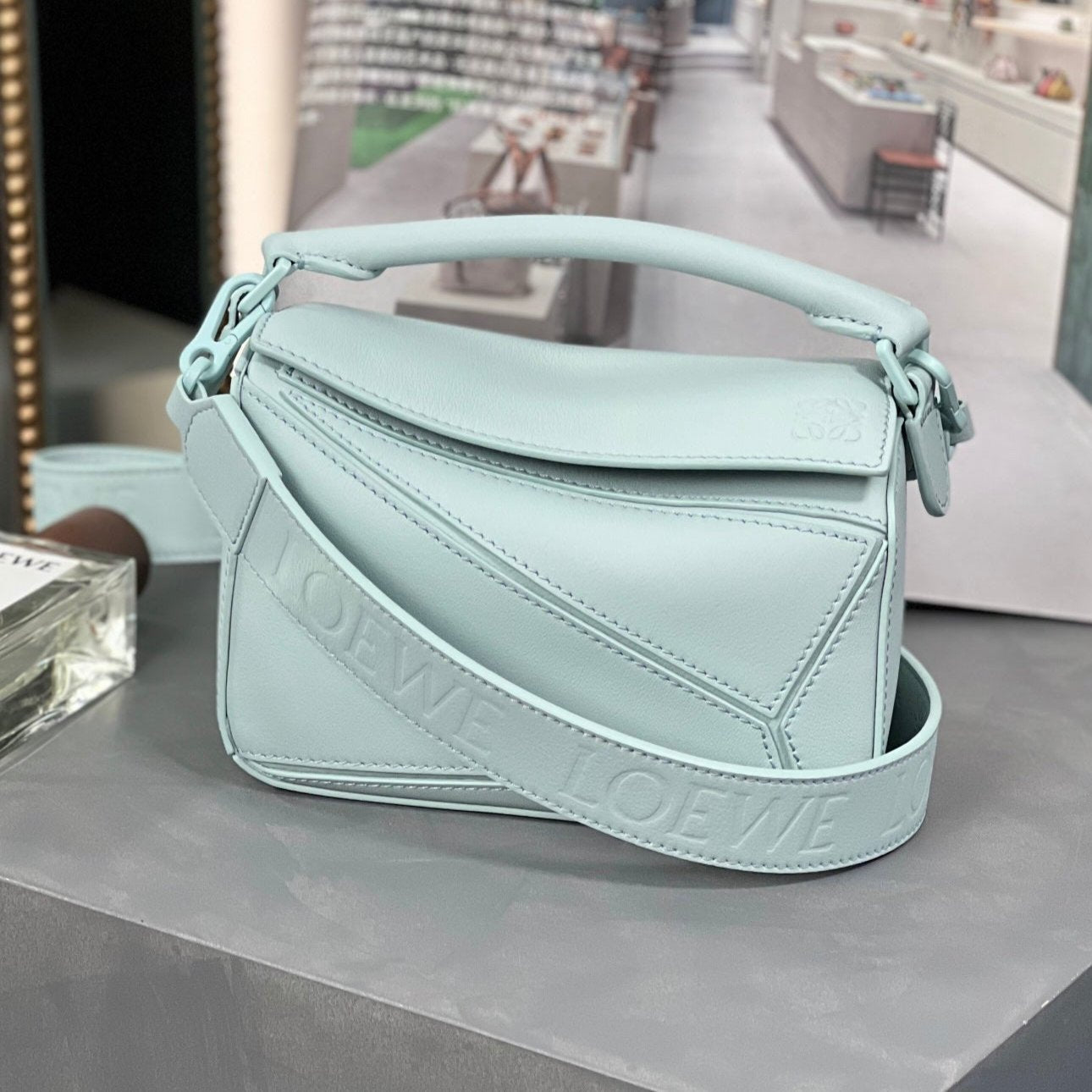 LOE MINI 18 PUZZLE BAG IN LIGHT BLUE SATIN CALFSKIN