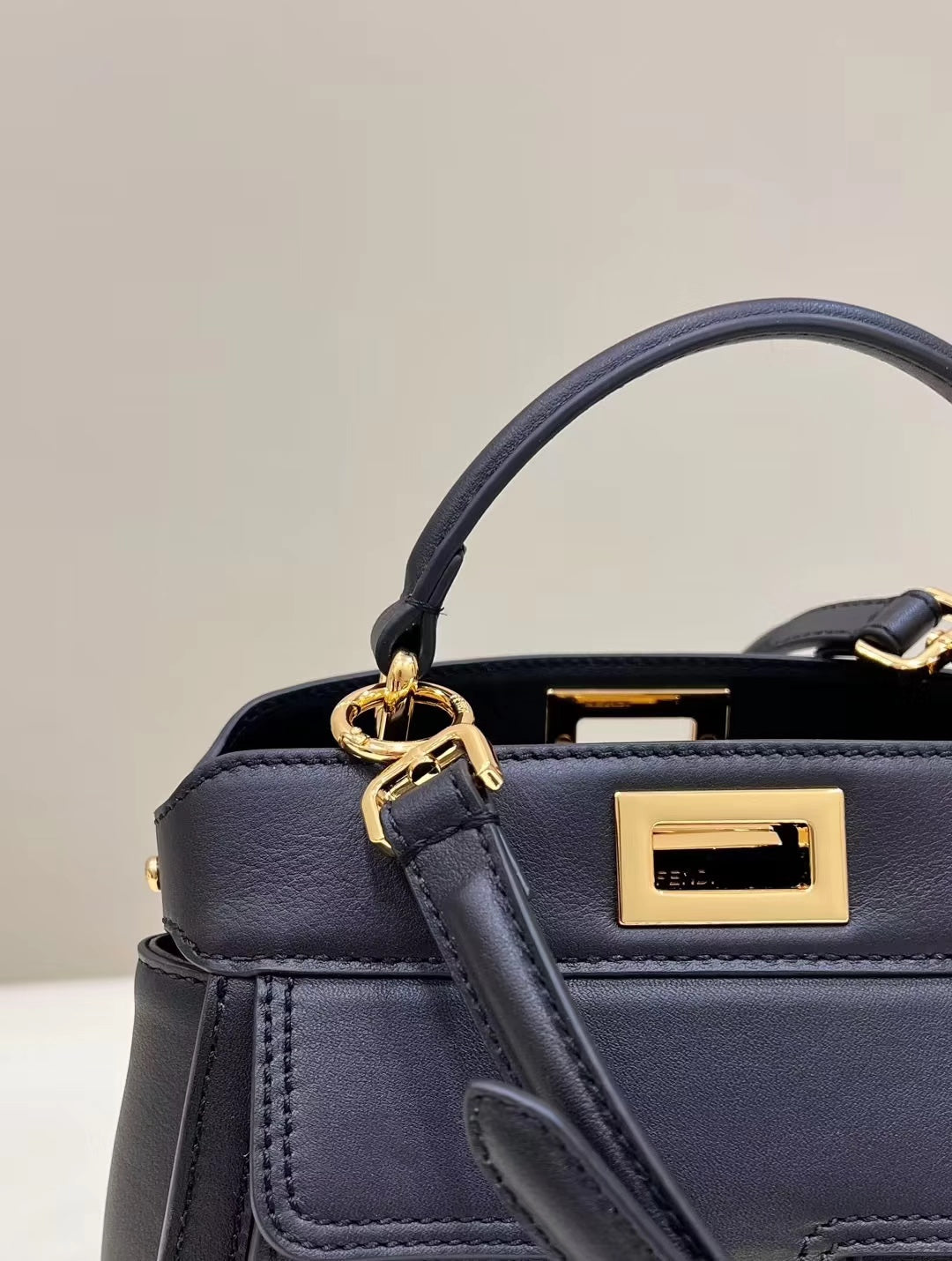 FENDI PEEKABOO MINI 23 BAG IN BLACK CALFSKIN WITH GOLD HARDWARE