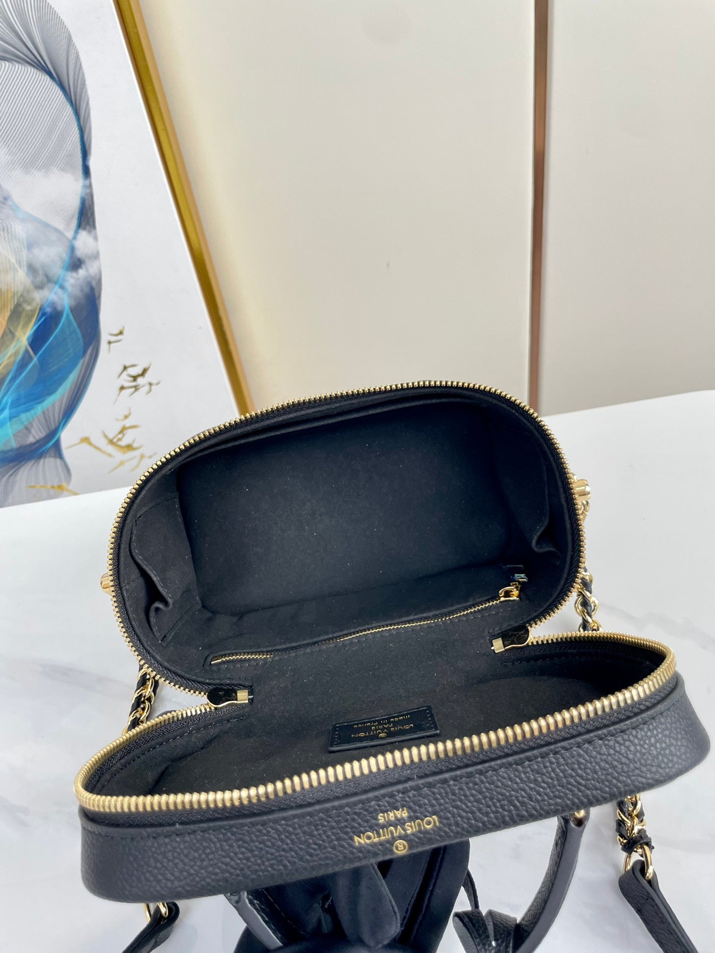 VANITY 19 IN BLACK MONOGRAM EMBOSSED CALFSKIN GOLD HARDWARE