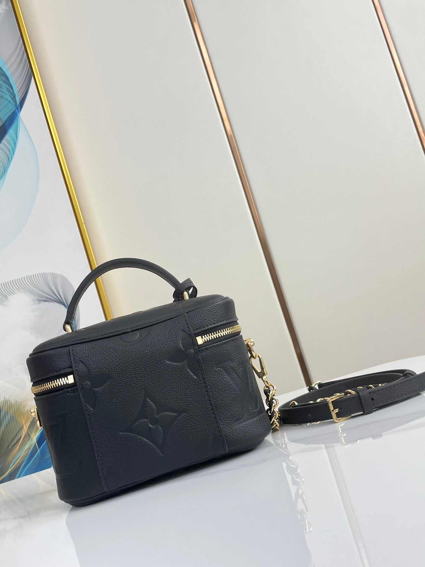 VANITY 19 IN BLACK MONOGRAM EMBOSSED CALFSKIN GOLD HARDWARE