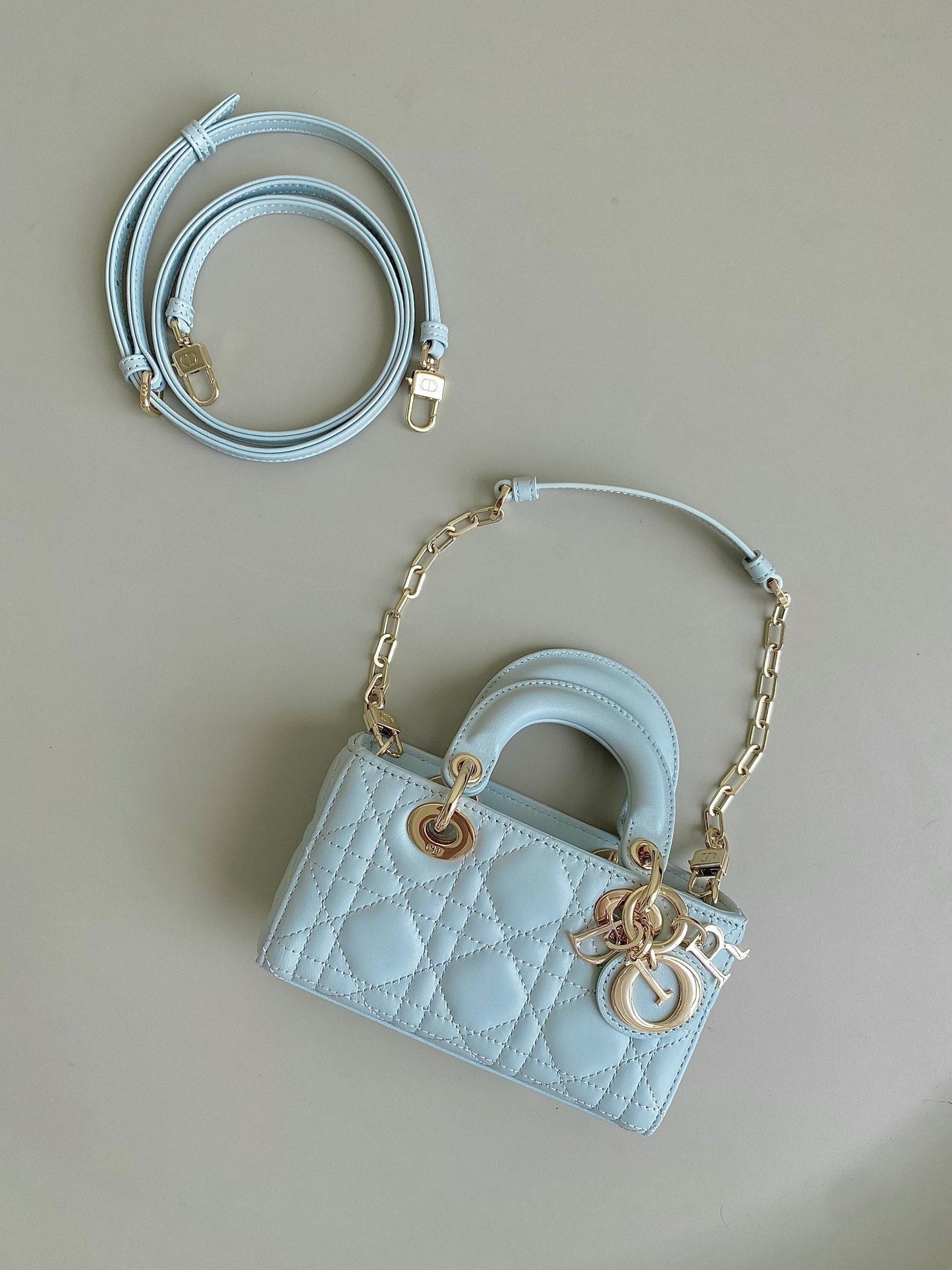 MINI D-JOY BAG 17 IN LIGHT BLUE LAMBSKIN