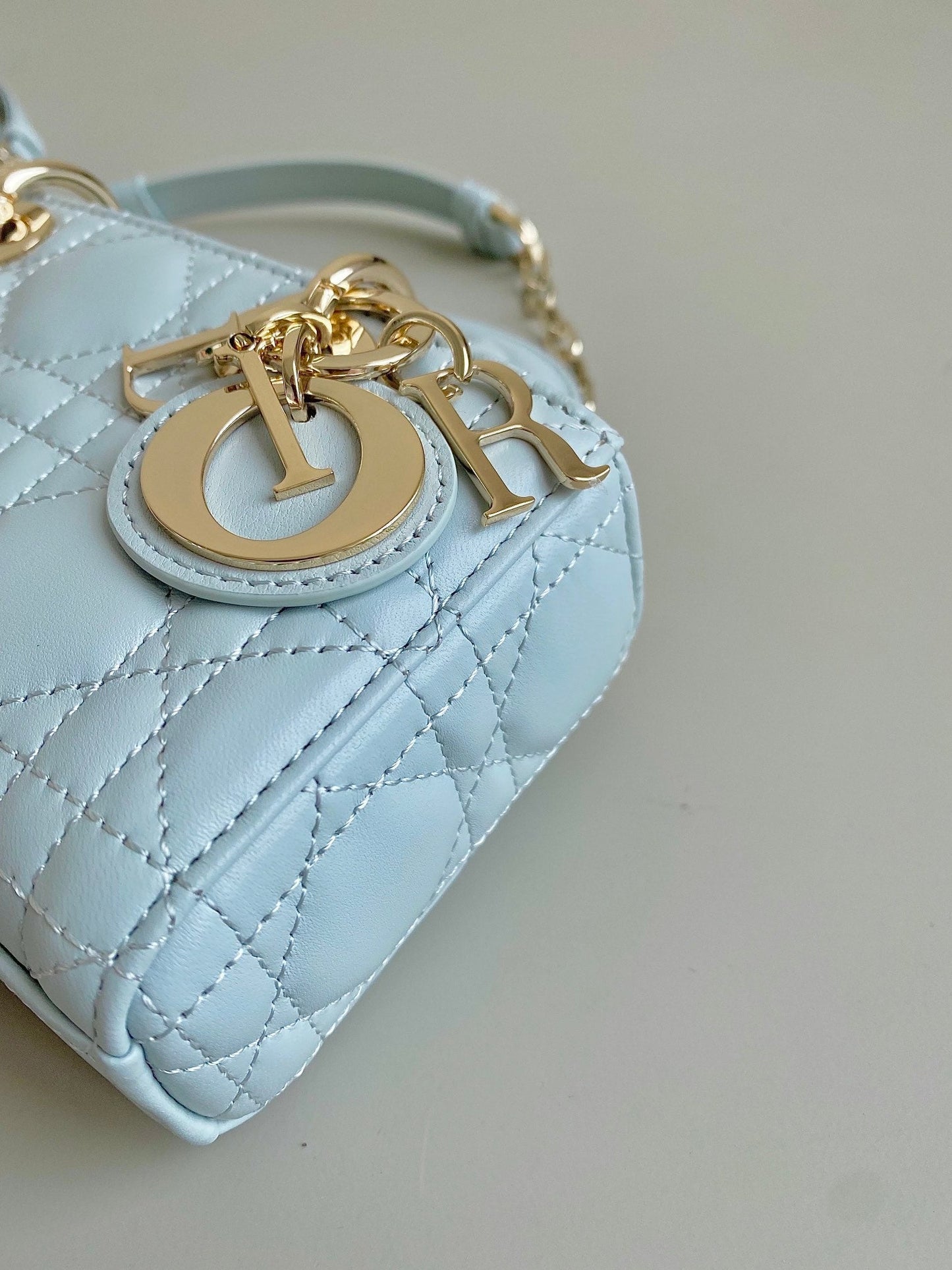 MINI D-JOY BAG 17 IN LIGHT BLUE LAMBSKIN