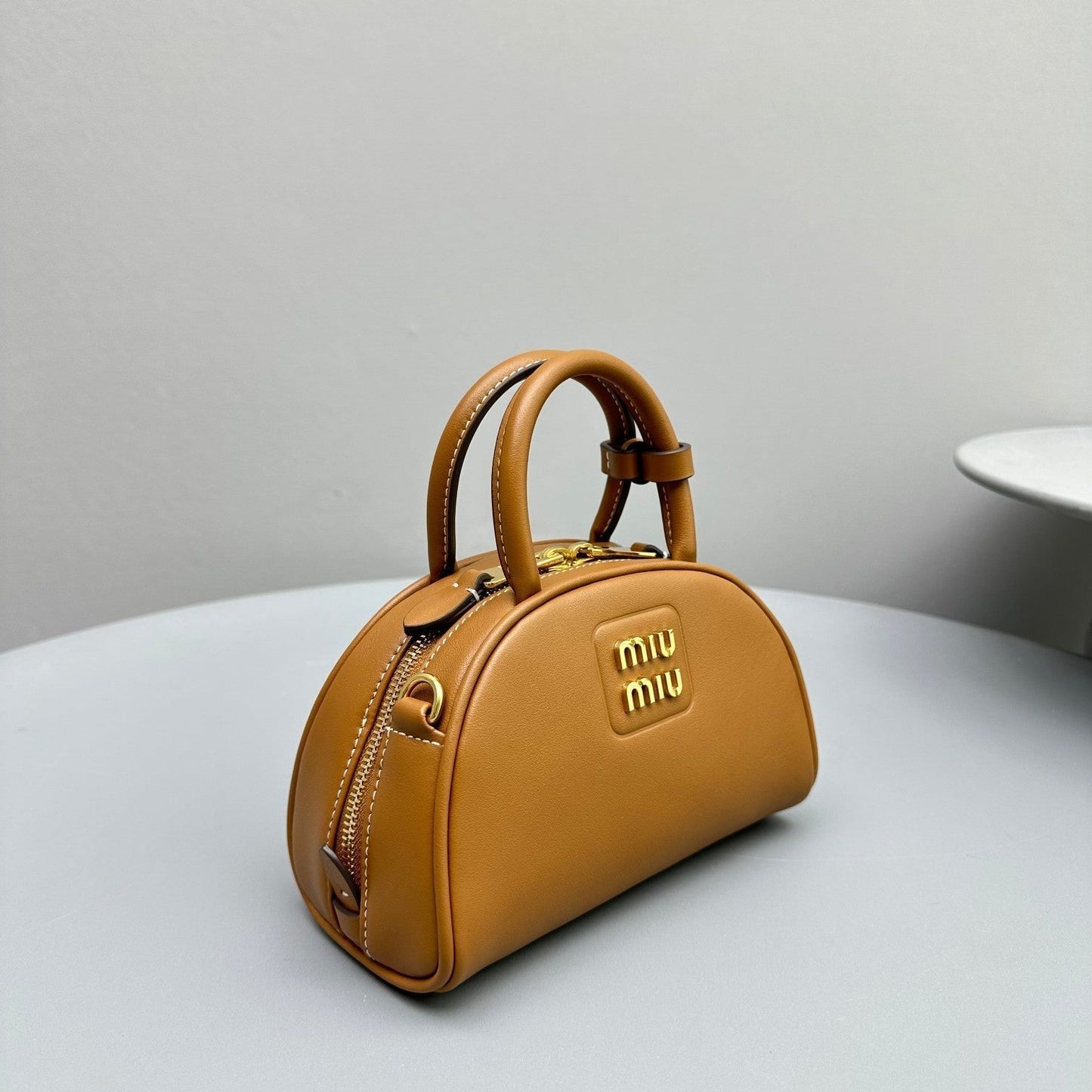 TOP-HANDLE 18 BAG IN CARAMEL BROWN CALFSKIN