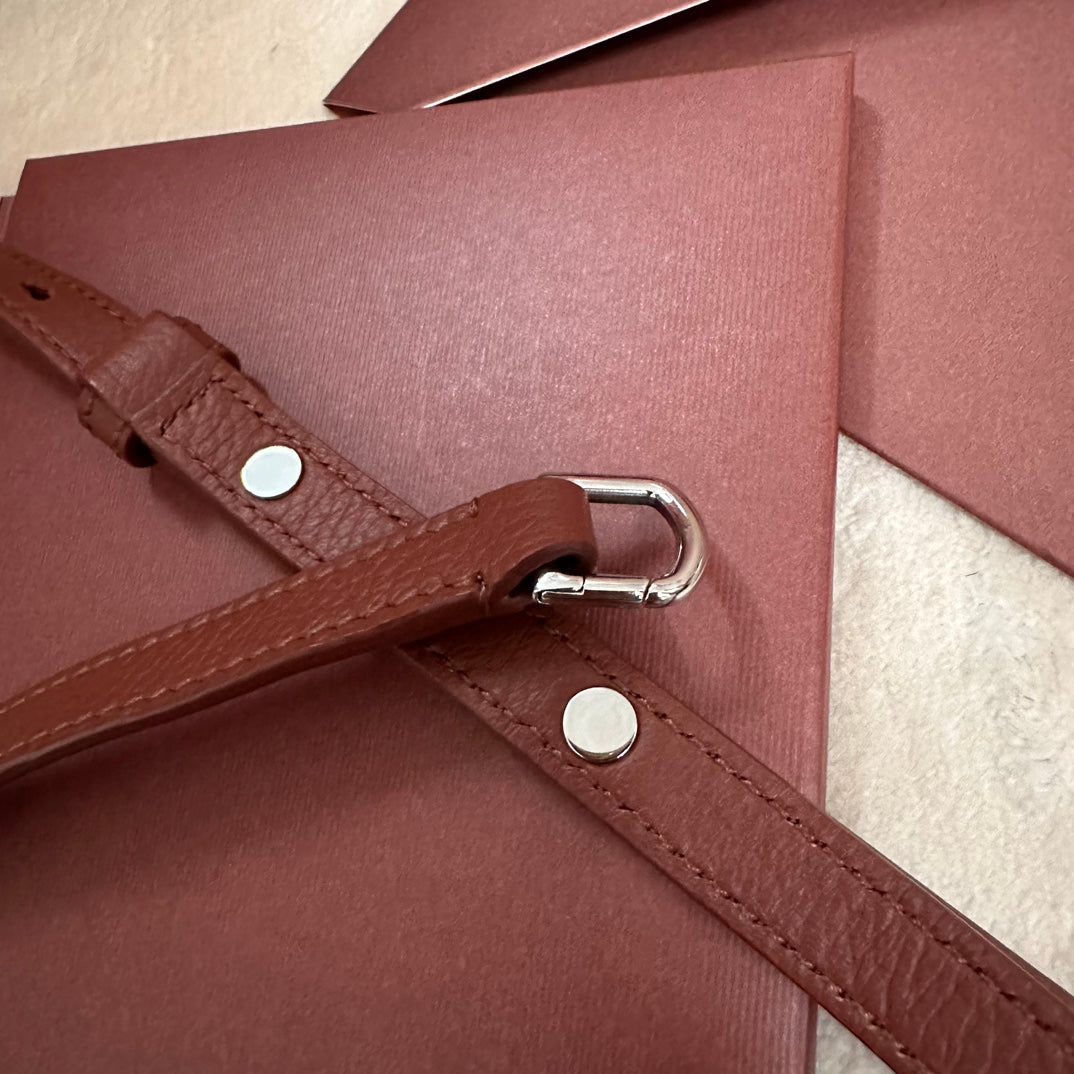 EXTRA POCKET L19 IN GARNET RED CALFSKIN WITH SILVER HARDWARE