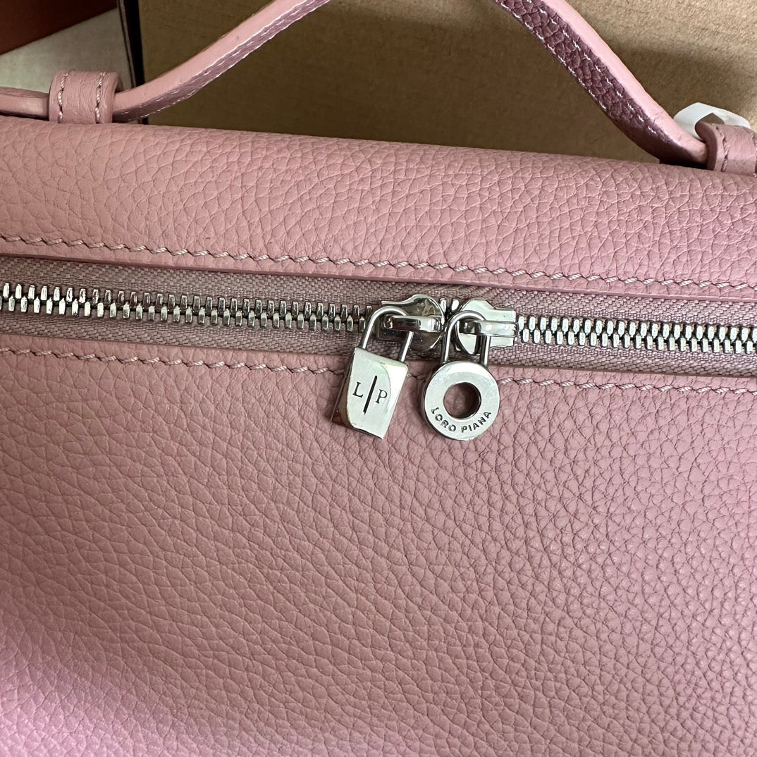 EXTRA POCKET L19 IN FLAMINGO PINK GRAINED CALFSKIN WITH SILVER HARDWARE