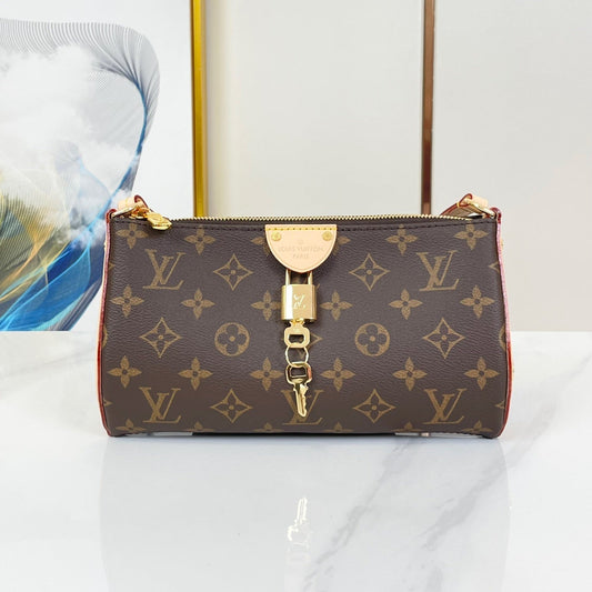 POCHETTE TIRETTE 22 IN BROWN MONOGRAM CANVAS GOLD BUCKLE