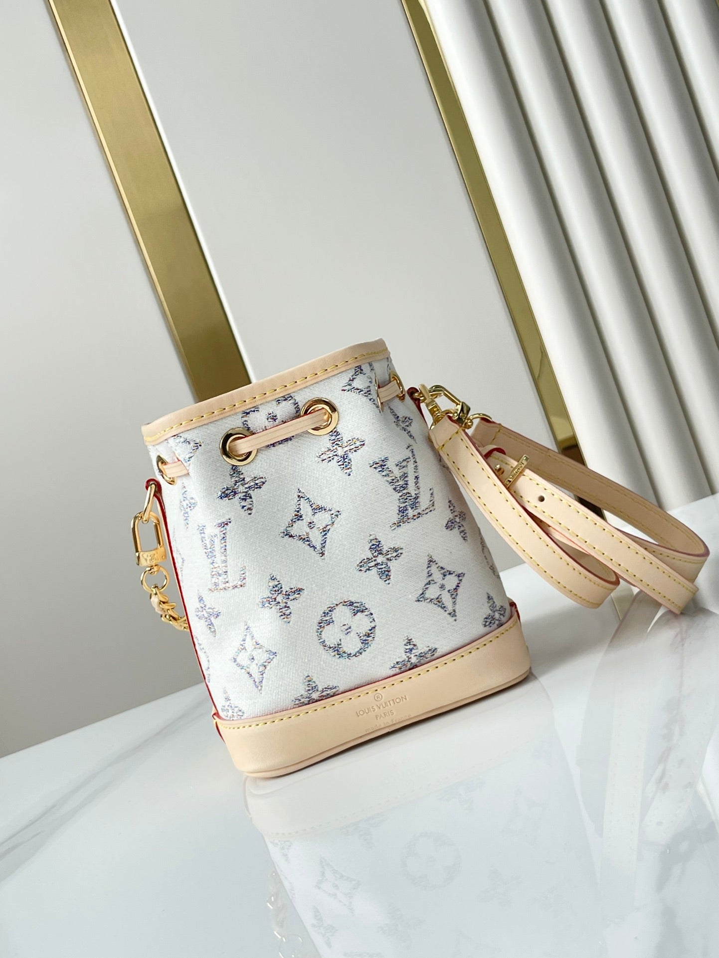 NANO NOÉ 16 IN WHITE MONOGRAM JACQUARD FABRIC AND BEIGE CALFSKIN TRIM