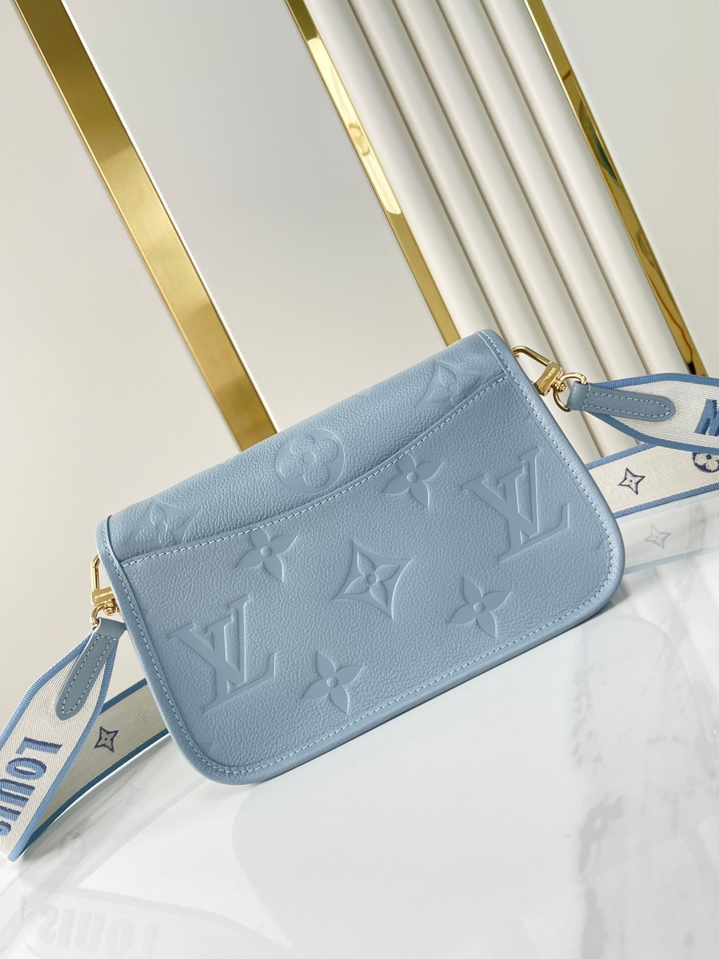 DIANE 23 IN BEAU BLUE MONOGRAM EMPREINTE LEATHER