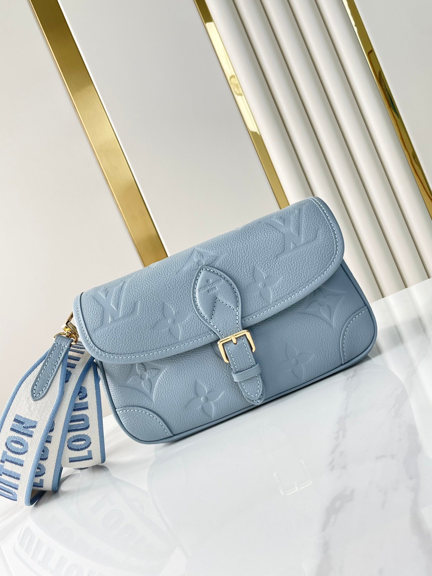 DIANE 23 IN BEAU BLUE MONOGRAM EMPREINTE LEATHER