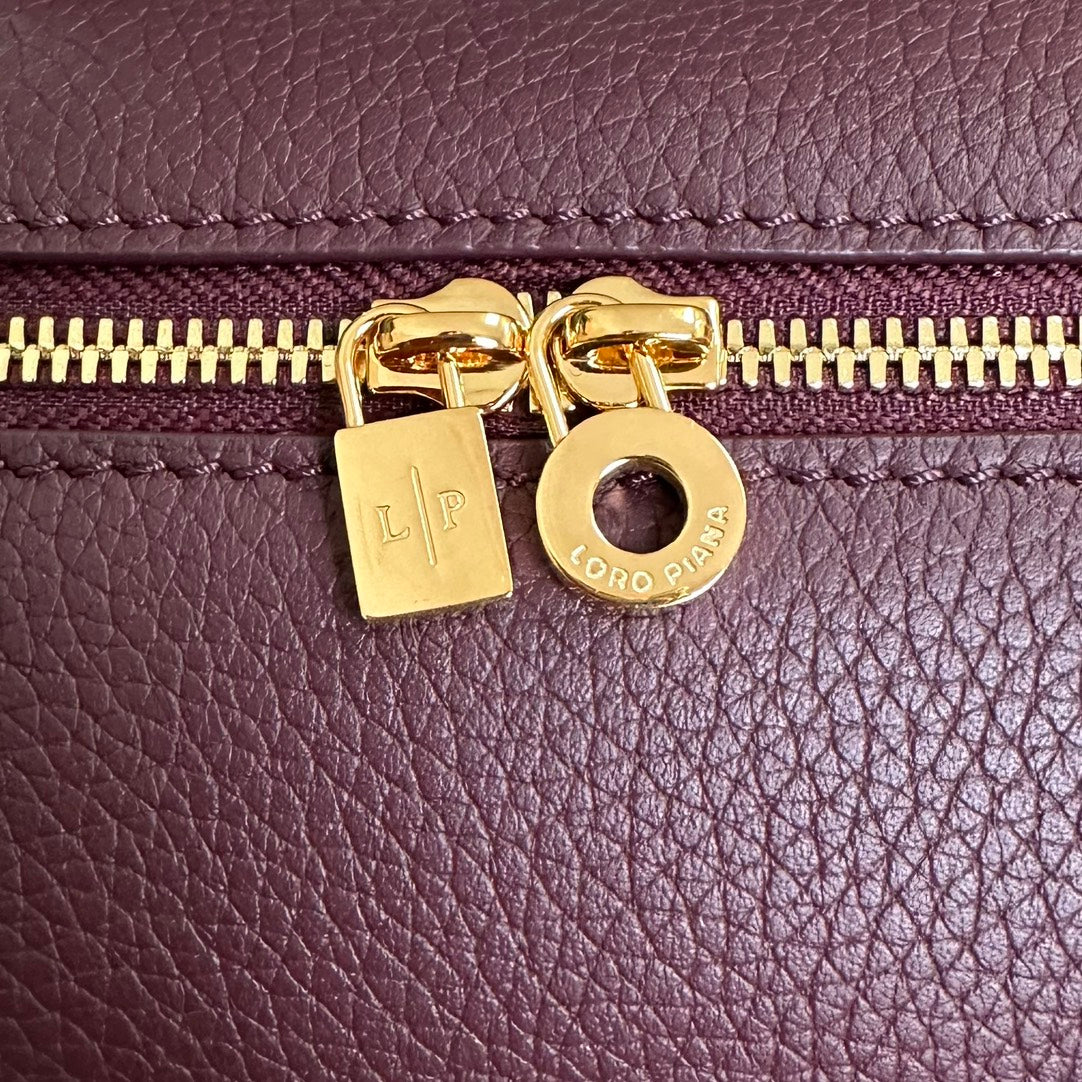 EXTRA POCKET L19 IN WINE PURPLE CALFSKIN WITH GOLD HARDWARE