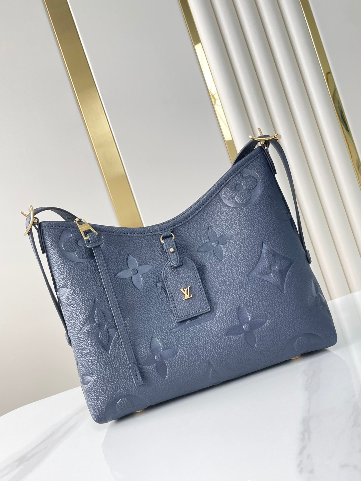 CARRYALL 29 IN DARK NAVY MONOGRAM EMPREINTE LEATHER