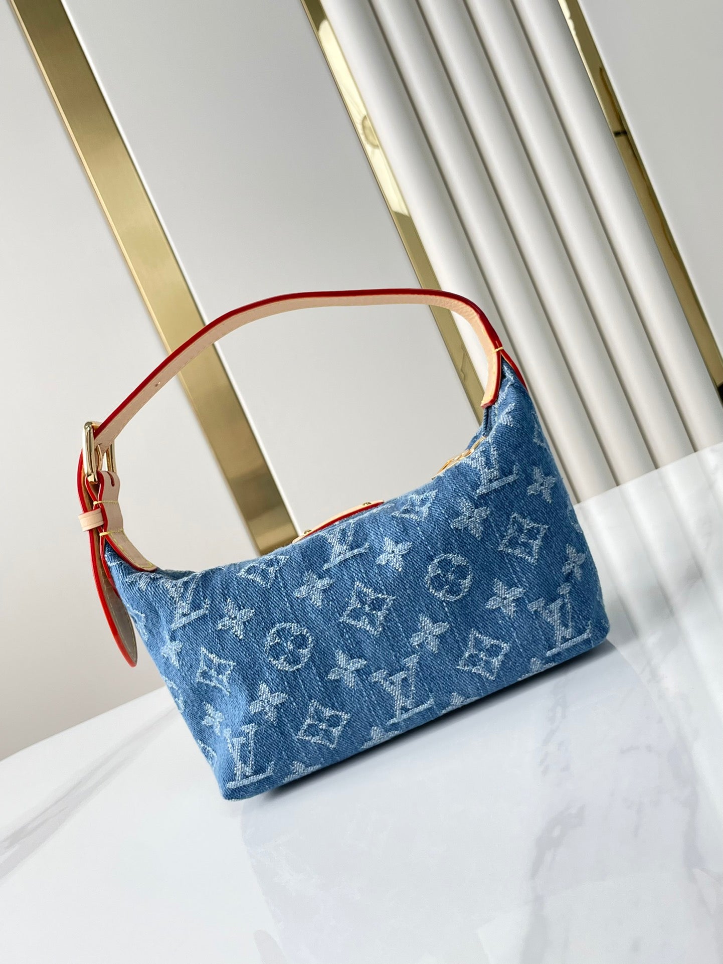 HILLS POCHETTE 18 IN BLUE MONOGRAM DENIM